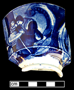 Pearlware London-shape cup and saucer reverse printed in dark blue. Printed mark on reverse of saucer with Christmas Eve (pattern name) and manufacturer (Clews). 4” cup rim diameter; 2.5” cup height; 5.75” saucer rim diameter; 1” saucer height. Note impressed asterisk mark in center of printed mark. Also impressed maker’s mark for James and Ralph Clews (1814-1834), Cobridge.